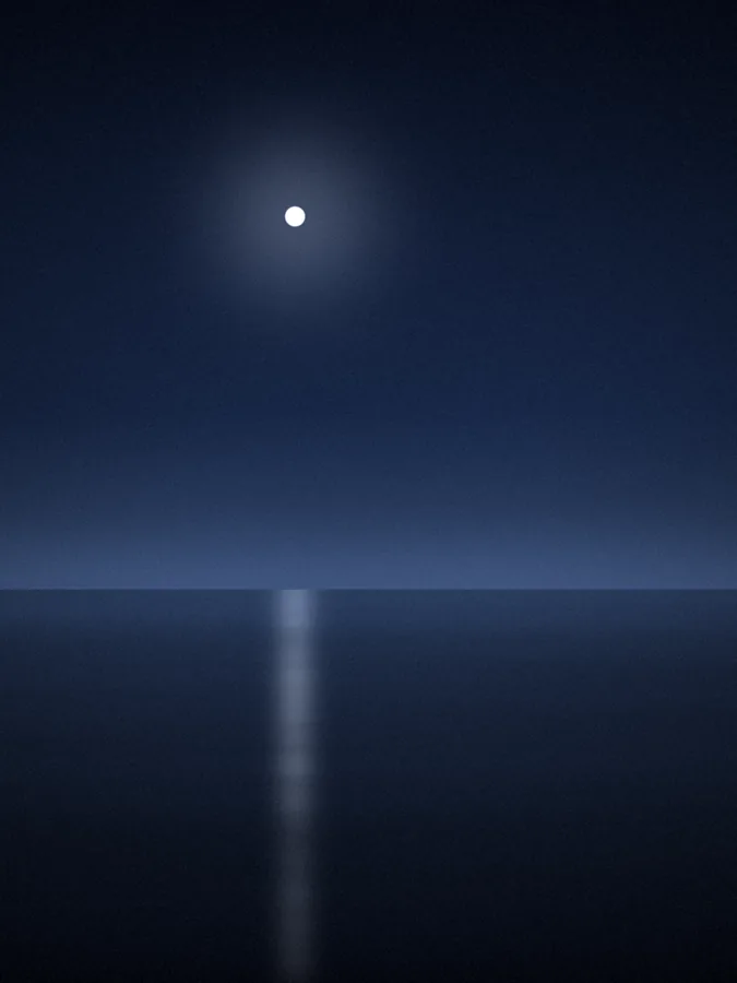 Moon over a dark blue sea with a silver reflection